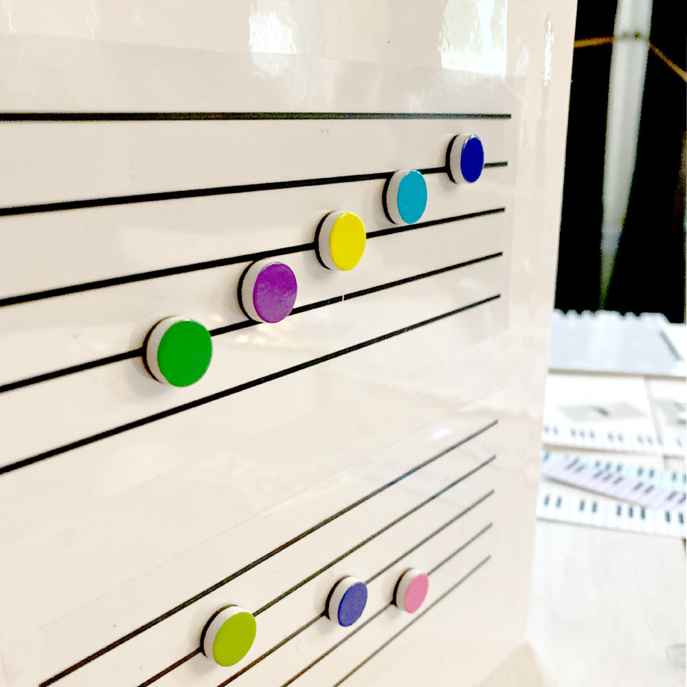 Vertical Piano and Musical Symbols